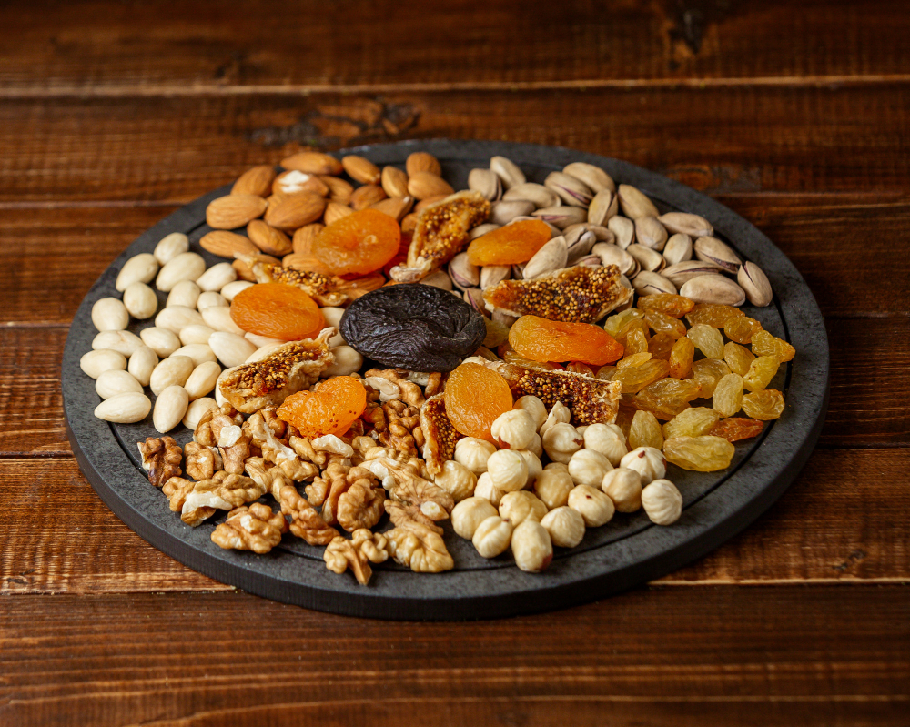 Variety of nuts on a plate set on table